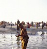 woman commited to her morning rituals in the ancient indian city of veranasi small