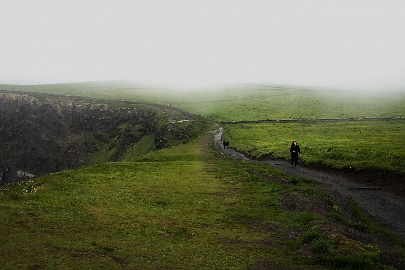 Linda Schaefer, WOMAN RUNNING TRHOUGH MIST OF MOHER CLIFFS
Photography, 25 3/4 x 21 in. (65.4 x 53.3 cm)
road with green on each side, image of 2 people in background, 1 woman running in front
SCH029
$500
Gallery staff will contact you 72 hours after purchase regarding any additional shipping costs.