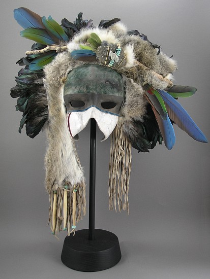Diana J. Smith, MASK 72
Mixed Media, 24 x 22 x 7 in.
One-of-a-kind mixed media mask, hand built stoneware face, Raku fired, all natural materials
DSM092