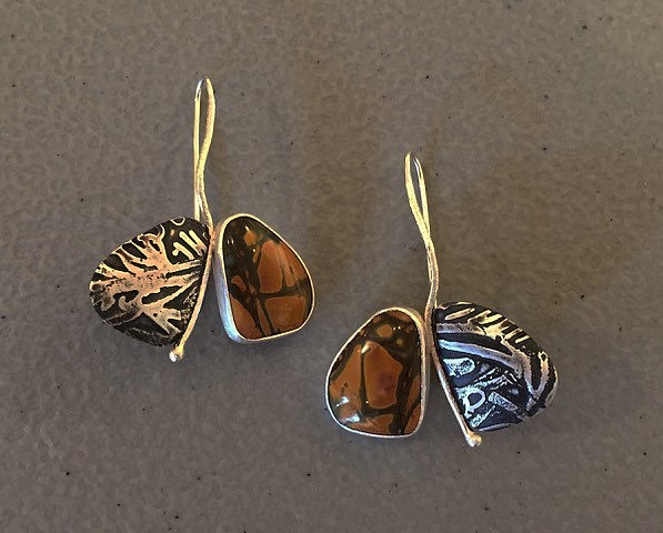 Elyse Bogart, #421 EARRING WITH CHERRY CREEK JASPER
Sterling Silver, Cherry Creek Jasper, Patina
EBOG#421
$325
Gallery staff will contact you 72 hours after purchase regarding any additional shipping costs.