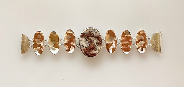 Elyse Bogart, #473 CANYON
Sterling Silver, Copper, Brass, Crazy Lace Agate
EBOG#473
$1,100
Gallery staff will contact you 72 hours after purchase regarding any additional shipping costs.