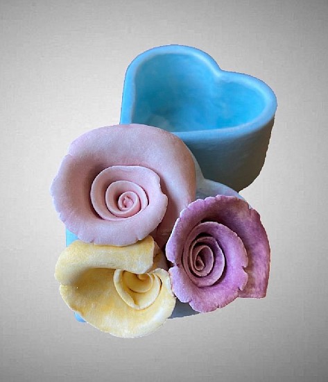 Nicole Moan, DARK BLUE HEART WITH YELLOW, PINK AND MAGENTA ROSES I
Porcelain clay, underglaze, glaze, 3 x 2 1/2 in. (7.6 x 6.3 cm)
MOAN011
$75
Gallery staff will contact you 72 hours after purchase regarding any additional shipping costs.