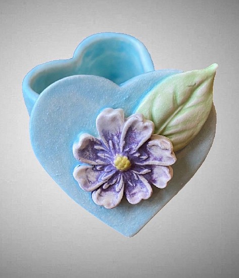 Nicole Moan, DARK BLUE MEDIUM HEART WITH PURPLE COSMOS I
Porcelain clay, underglaze, glaze, 1 1/2 x 2 1/4 in. (3.8 x 5.7 cm)
MOAN014
$65
Gallery staff will contact you 72 hours after purchase regarding any additional shipping costs.