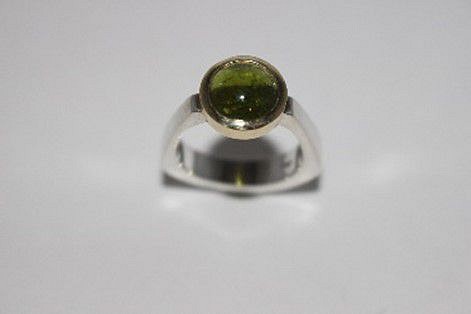 Sheridan Conrad, SCULPTURAL RING, 2019
Sterling Silver, 18kt yellow bezel gold, green tourmaline
CONR057
$675
Gallery staff will contact you 72 hours after purchase regarding any additional shipping costs.